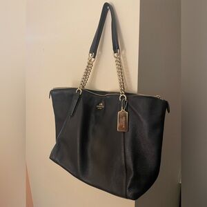 Coach Ava chain tote purse. Black. Pebbled leather. Gold hardware.